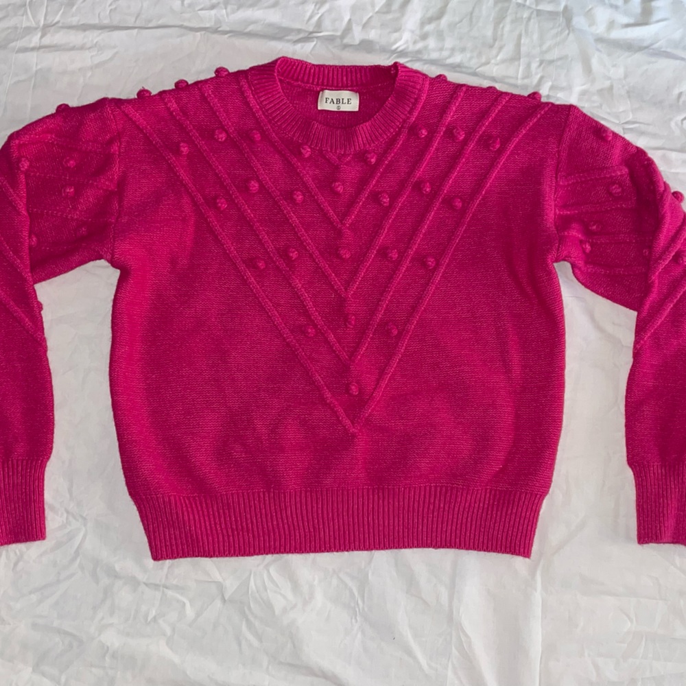 Pink sweater with design